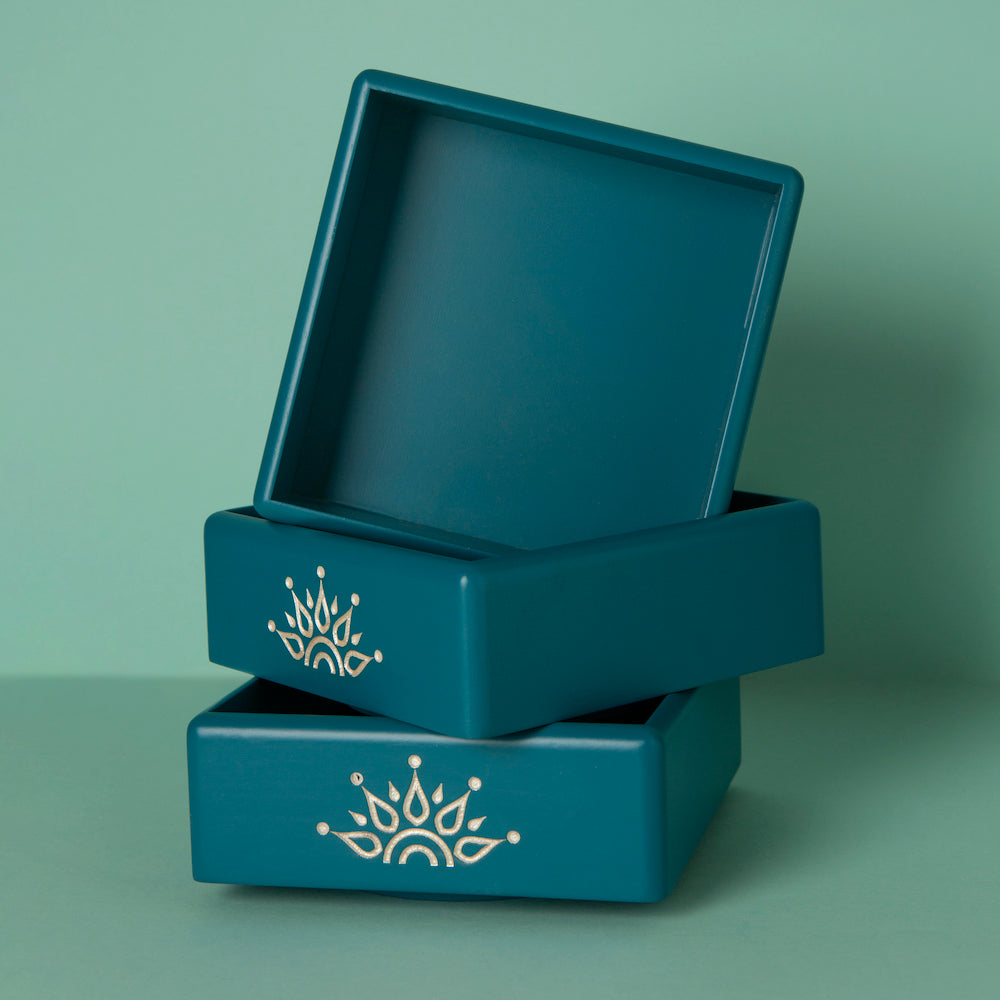 Elevate your organization game with the Blue Revolving Jar Tray Organizer, meticulously crafted from Premium Painted Wood.