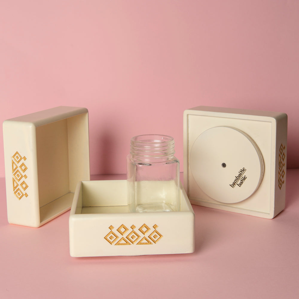 3different angles of the Revolving Spice Jar Tray in white colour on a pink background