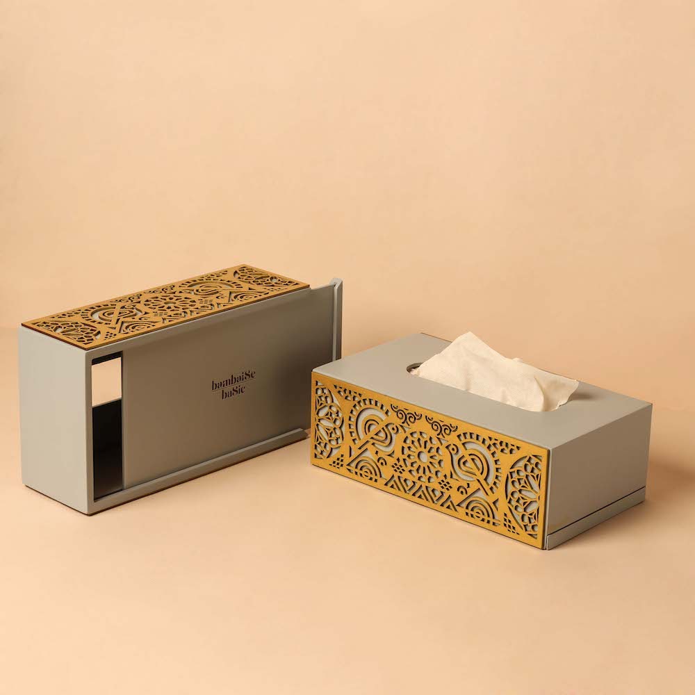 Premium tissue box with sliding mechanism base and smooth surface on all sides.