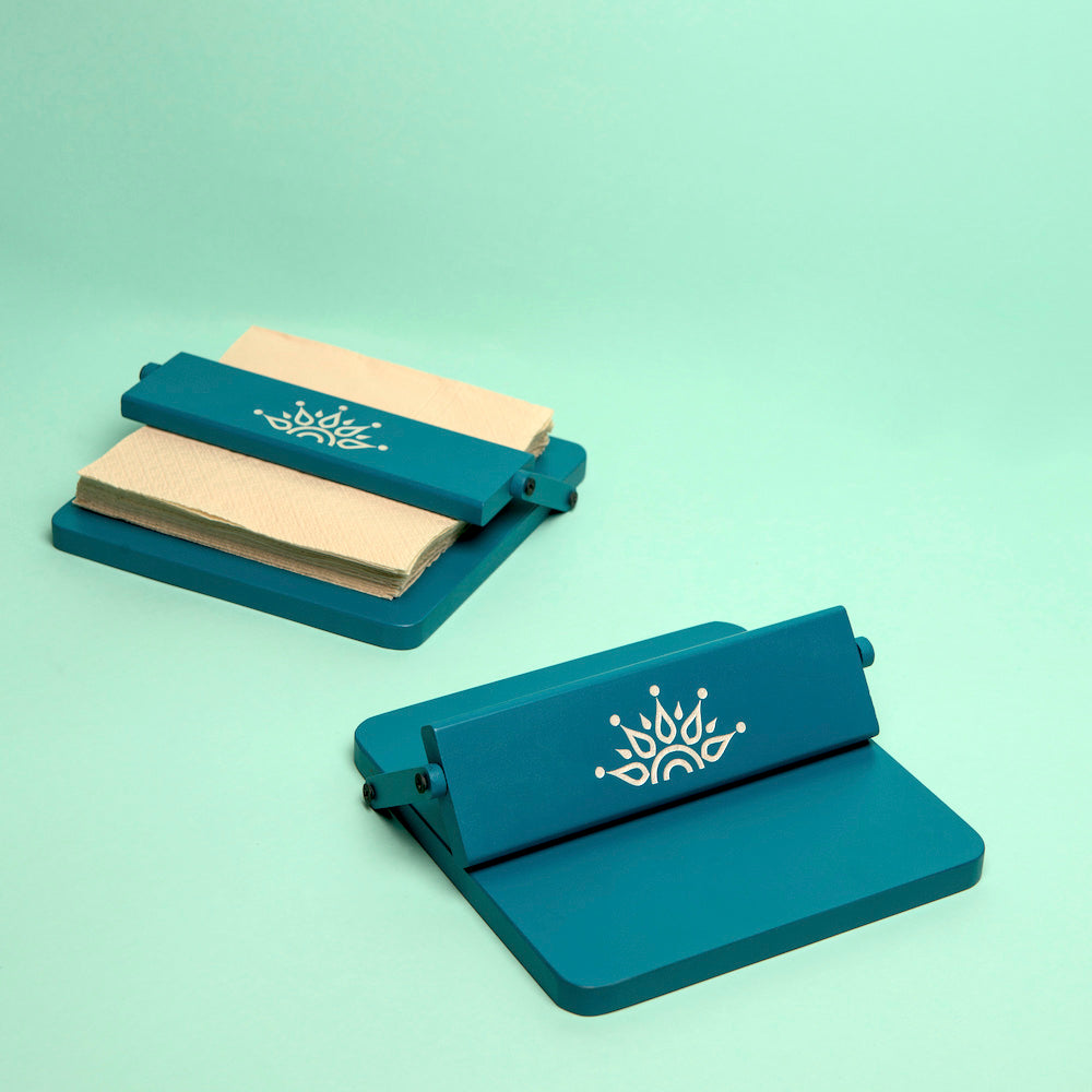 Blue napkin tray with movable flap